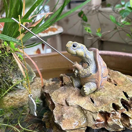 Cute fishing turtle - fishing, statue